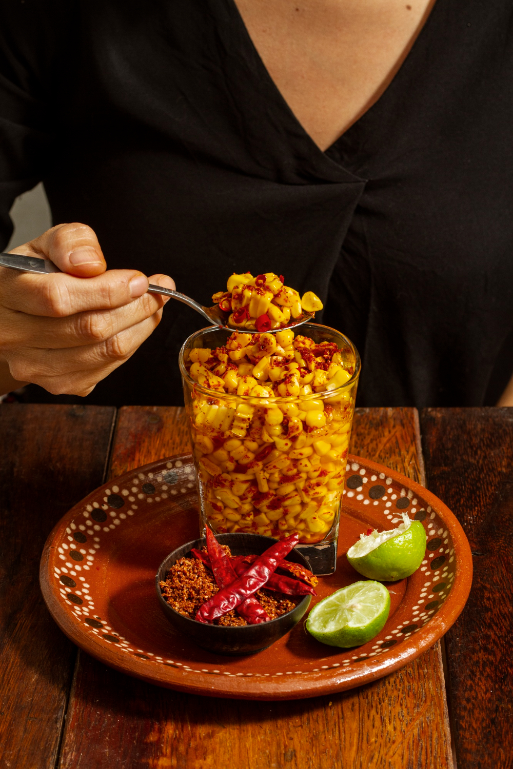 Creamy Mexican street corn dip served with crispy tortilla chips.